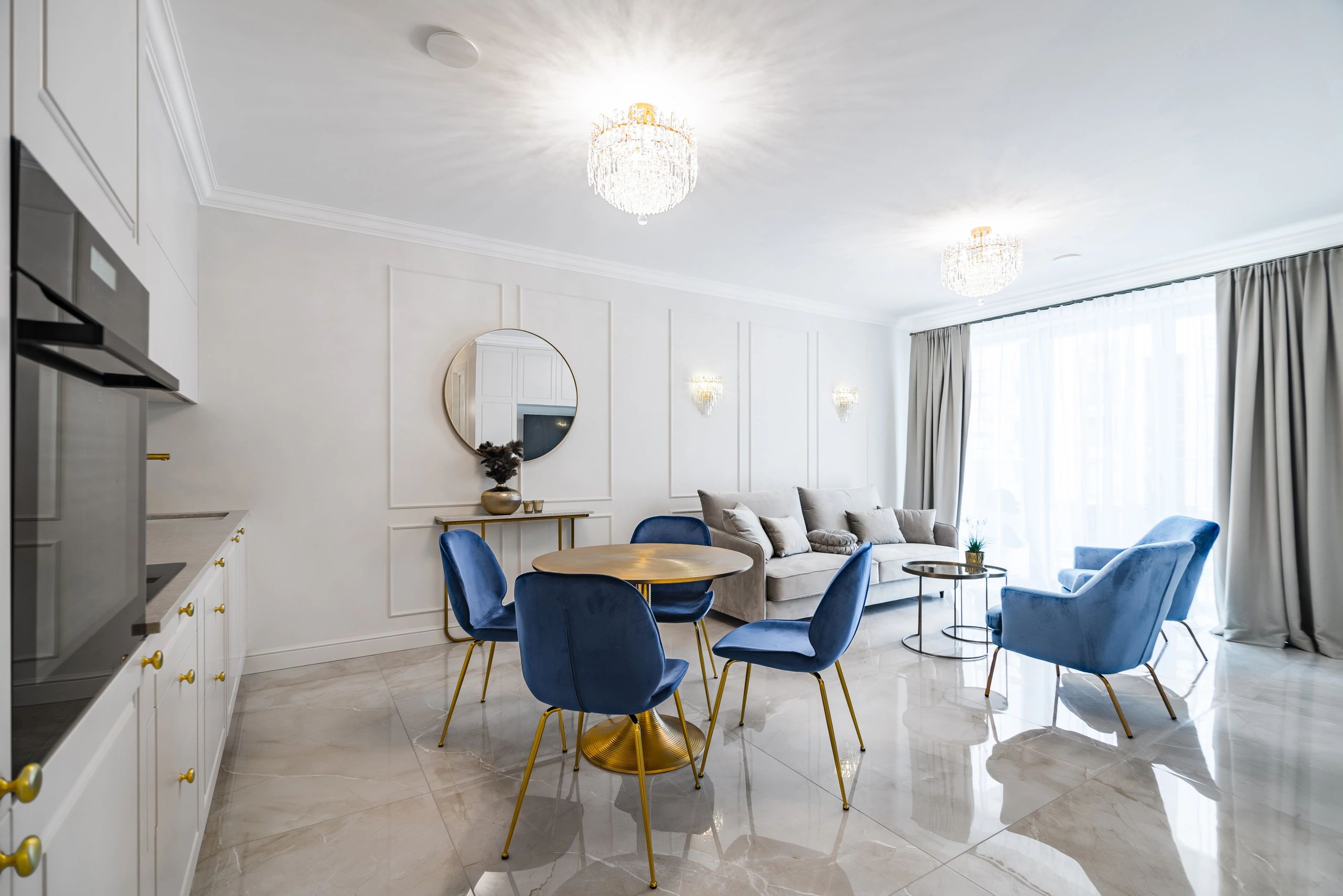 Bright apartment interior with connected kitchen and living area