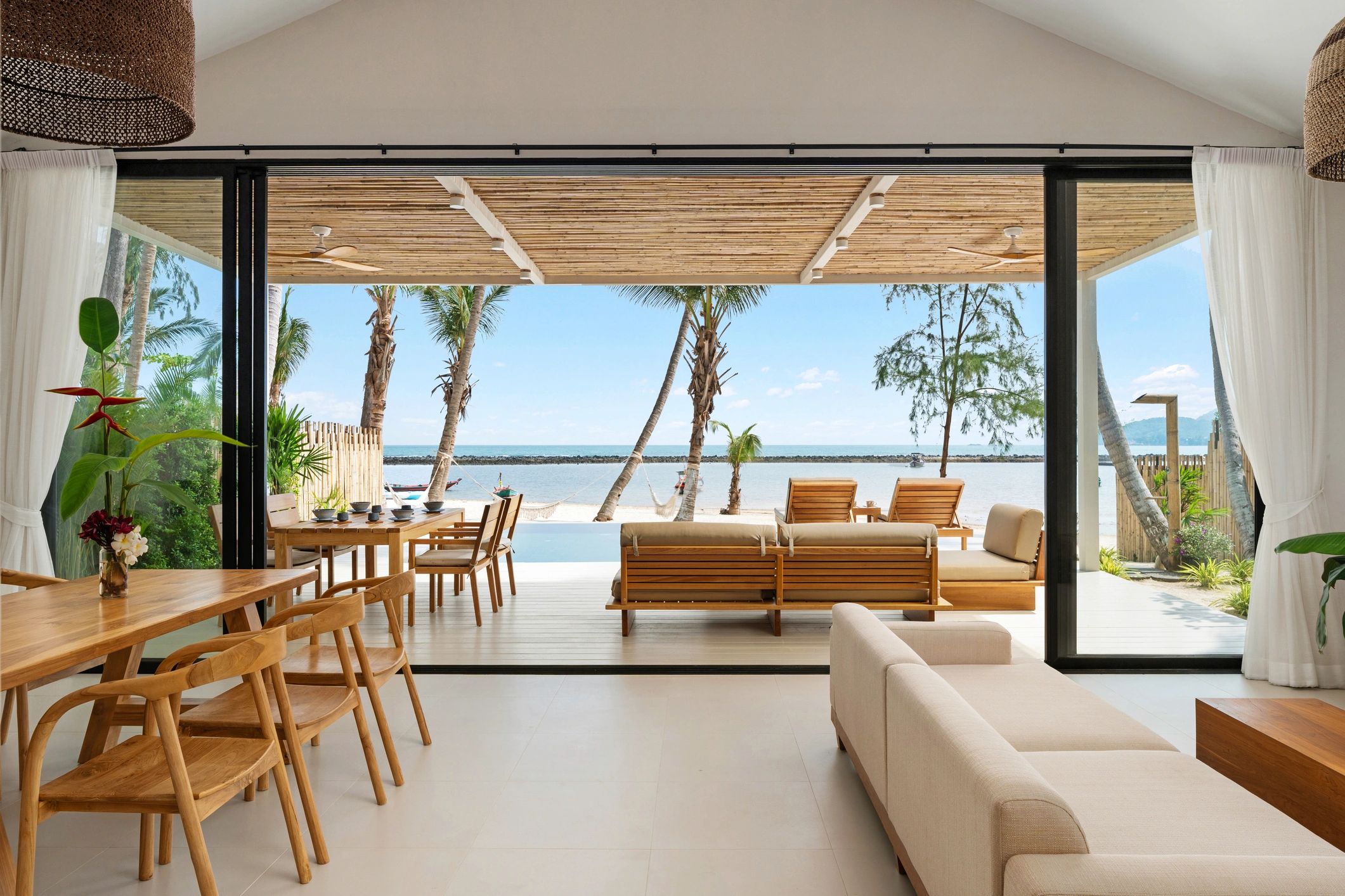 Modern open living and dining area with contemporary furnishings